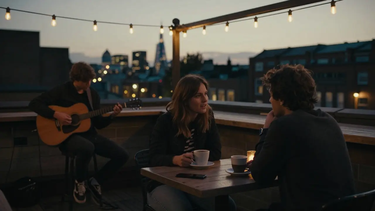 A couple conversing at a cozy Camden rooftop bar at twilight.
