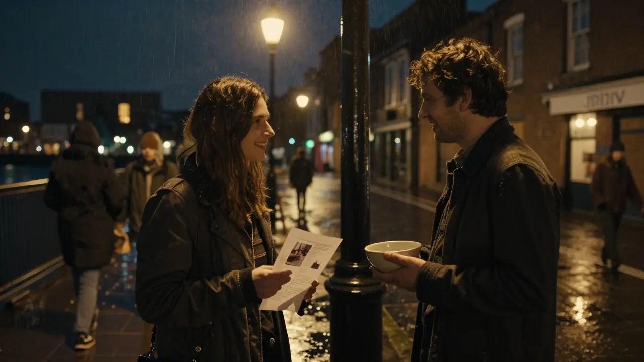 Two strangers share a quiet moment of connection after an art opening, holding pieces of art under a streetlamp at night.