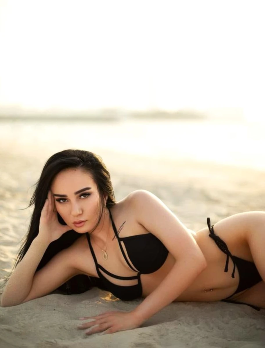 Malika escort in London